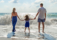 Family in ocean. Photo by Jean Beaufort